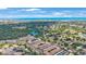 Wide aerial view of the community and the ocean at 10033 64Th N Ave # 16, St Petersburg, FL 33708