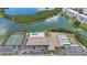 Aerial view of community amenities, including tennis and pool at 10033 64Th N Ave # 16, St Petersburg, FL 33708