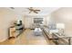 Living room with light wood flooring, sofa, and coffee table at 10033 64Th N Ave # 16, St Petersburg, FL 33708
