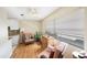 Cozy living room featuring hardwood floors and a relaxing sitting area at 10033 64Th N Ave # 16, St Petersburg, FL 33708