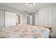 Main bedroom with built-in cabinets and en-suite bathroom at 1198 40Th Ne Ave, St Petersburg, FL 33703