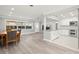 Bright dining area with hardwood floors and view to kitchen at 1198 40Th Ne Ave, St Petersburg, FL 33703