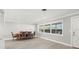 Dining room features hardwood floors and large windows at 1198 40Th Ne Ave, St Petersburg, FL 33703
