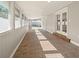 Screened pool area with tiled flooring and access to house at 1198 40Th Ne Ave, St Petersburg, FL 33703