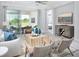 Spacious living room with access to a patio, light and airy feel at 12094 New Tranquility Path, Venice, FL 34293