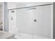 Large walk-in shower with built-in seat and window at 12094 New Tranquility Path, Venice, FL 34293