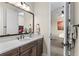 Modern bathroom with a vanity, mirror, and shower at 12405 Stonelake Ranch Blvd, Thonotosassa, FL 33592