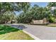 StoneLake community entrance with paved roads, stone signage, and meticulously maintained landscaping at 12405 Stonelake Ranch Blvd, Thonotosassa, FL 33592