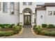 Double doors entry with stone pathway and landscaping at 12405 Stonelake Ranch Blvd, Thonotosassa, FL 33592