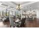 Open concept kitchen with island, stainless steel appliances, and hardwood floors at 12405 Stonelake Ranch Blvd, Thonotosassa, FL 33592