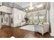 Spacious living room with high ceilings, hardwood floors, and a grand piano at 12405 Stonelake Ranch Blvd, Thonotosassa, FL 33592