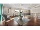 Bright loft area with hardwood floors, decorative table, and a sitting area overlooking the home at 12405 Stonelake Ranch Blvd, Thonotosassa, FL 33592