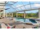Stunning outdoor pool area with a spa and a screened enclosure at 12405 Stonelake Ranch Blvd, Thonotosassa, FL 33592