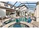 Resort-style pool and spa with covered patio at 12405 Stonelake Ranch Blvd, Thonotosassa, FL 33592