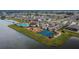 Aerial view of community pool, playground, and tennis courts at 12940 Brookside Moss Dr, Riverview, FL 33579