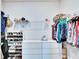 Well-organized closet with ample shelving and hanging space at 12940 Brookside Moss Dr, Riverview, FL 33579