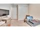 Home office with large closet, treadmill and tv at 12940 Brookside Moss Dr, Riverview, FL 33579