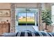 Relaxing screened porch with view of backyard and pond at 12940 Brookside Moss Dr, Riverview, FL 33579