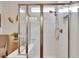 Spacious walk-in shower with glass enclosure and tiled walls at 12940 Brookside Moss Dr, Riverview, FL 33579
