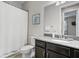 Bathroom with shower, toilet and granite countertop at 13614 Tonya Anne Dr, Riverview, FL 33579