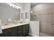 Elegant bathroom with double vanity and large shower at 13614 Tonya Anne Dr, Riverview, FL 33579