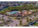 Resort-style pool and clubhouse with surrounding landscaping at 13614 Tonya Anne Dr, Riverview, FL 33579