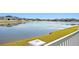 Scenic view of a tranquil lake with homes in the background at 13614 Tonya Anne Dr, Riverview, FL 33579