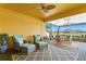 Spacious covered patio with seating and dining areas at 13614 Tonya Anne Dr, Riverview, FL 33579