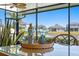 Glass-top patio table with margarita glasses and shaker at 13614 Tonya Anne Dr, Riverview, FL 33579