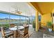 Large patio with seating and lake views at 13614 Tonya Anne Dr, Riverview, FL 33579