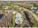 Aerial view of condo community and landscape at 1433 Pine Glen Pl # D1, Tarpon Springs, FL 34688