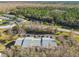 Aerial view of condo building and surrounding area at 1433 Pine Glen Pl # D1, Tarpon Springs, FL 34688