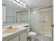 Bathroom with shower, toilet and sink at 1433 Pine Glen Pl # D1, Tarpon Springs, FL 34688