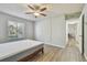 Bedroom with view of hallway and outside at 1433 Pine Glen Pl # D1, Tarpon Springs, FL 34688