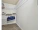 Shelved closet with ample storage space at 1433 Pine Glen Pl # D1, Tarpon Springs, FL 34688
