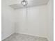 Small, empty dining area with gray tile floor at 1433 Pine Glen Pl # D1, Tarpon Springs, FL 34688