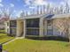 Front view of condo building and entrance at 1433 Pine Glen Pl # D1, Tarpon Springs, FL 34688