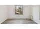 Bright office with wood-look floors and window view at 1433 Pine Glen Pl # D1, Tarpon Springs, FL 34688