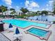 Relaxing community pool and spa with ample seating at 1433 Pine Glen Pl # D1, Tarpon Springs, FL 34688