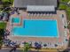 Relaxing community pool area with plenty of lounge chairs at 1433 Pine Glen Pl # D1, Tarpon Springs, FL 34688