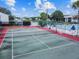 Well-maintained tennis court, ready for a game at 1433 Pine Glen Pl # D1, Tarpon Springs, FL 34688