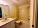 Clean bathroom with a tub and shower combination at 1568 Nantucket Ct # 1302, Palm Harbor, FL 34683