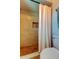 Shower stall with tile surround and curtain at 16115 Country Crossing Dr, Tampa, FL 33624