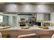 Kitchen features stainless steel appliances and breakfast bar at 16115 Country Crossing Dr, Tampa, FL 33624