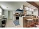 Galley kitchen with stainless steel appliances and white cabinets at 16115 Country Crossing Dr, Tampa, FL 33624