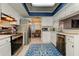 Modern kitchen with stainless steel appliances and blue accents at 16115 Country Crossing Dr, Tampa, FL 33624