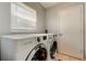 Laundry room with LG washer and dryer at 16115 Country Crossing Dr, Tampa, FL 33624