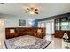 Bright living room with sectional sofa and wood accents at 16115 Country Crossing Dr, Tampa, FL 33624