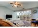 Living room features comfortable seating and access to kitchen at 16115 Country Crossing Dr, Tampa, FL 33624