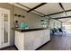 Outdoor patio bar with stone countertop, perfect for entertaining at 16115 Country Crossing Dr, Tampa, FL 33624